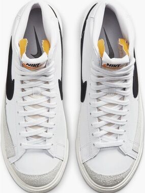Nike White High-Top Sneakers with Black Swoosh and Red Box Accent